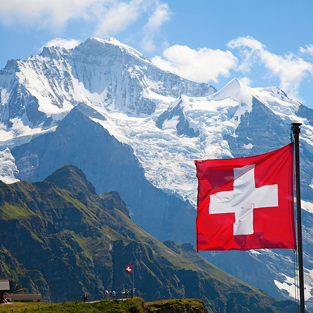 Swiss Alps and national flag, Switzerland scenery Swiss Alps and national flag, Switzerland scenery