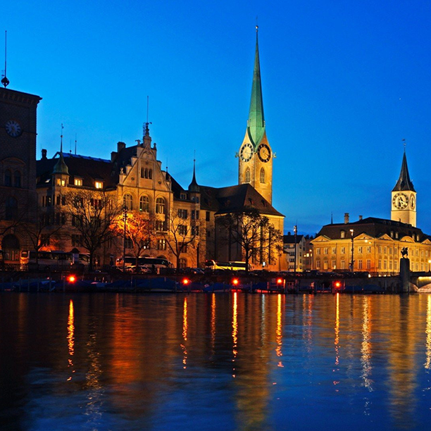 Zurich old town illuminated at night along the Limmat river Zurich old town illuminated at night along the Limmat river